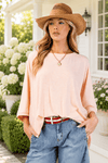 Up close image of the Peach Oversized Dolman Sleeve Top