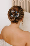 Flat Round Hair Clip in Tortoise - styled in an all-up hairstyle