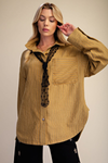 Golden Kiwi poly twill striped oversized button down shirt styled open over a black lace cami