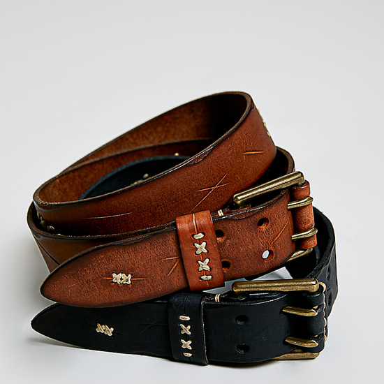POL Clothing distressed genuine leather double-prong belts in chestnut and black with whipstitch embroidery and etched detailing