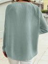 Back view of jade green textured jacquard shift top featuring relaxed silhouette and lightweight fabric for everyday wear