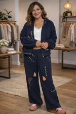 Navy textured boho lounge set featuring wide leg pants with tassel drawstring and matching cozy jacket.